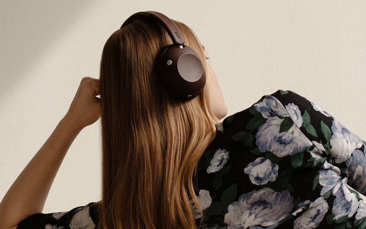 sudio k3 Pro Onyx black headphone on a model